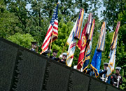 The Joint Service Color Guard presents the colors at the Vietnam Veterans Memorial in Washington, D.C.