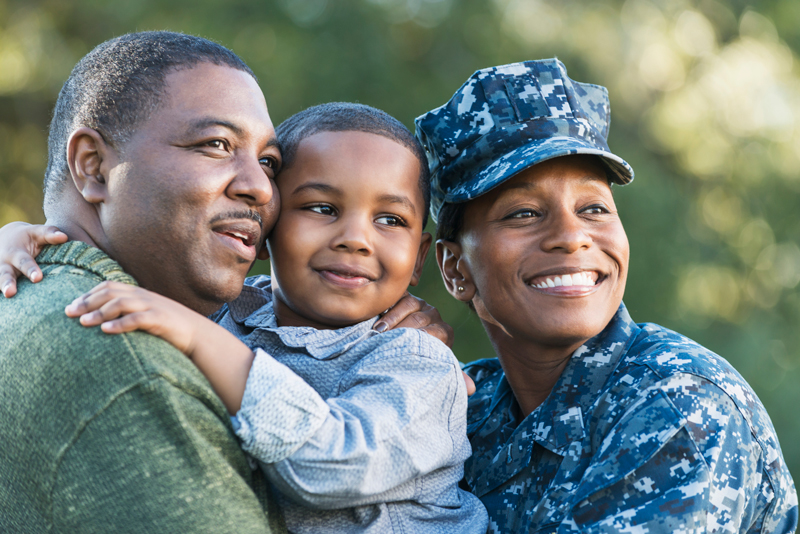 Navy servicewoman with her family.