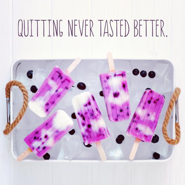 Photo of blueberry and cream popsicles on a tray with blueberries. Text says "Quitting never tasted better."