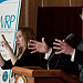 Office of Personnel Management Director John Berry addresses the Work Force Recruitment Programs (WRP) Your Key To Hiring Student Interns and Employees with Disabilities event hosted by the United States Department of Agriculture (USDA) in the Jefferson Auditorium, Washington, D.C. on Tuesday, February 7, 2012. Beside him American Sign Language interpreter Megan Adams communicates to the hearing impaired in the audience.