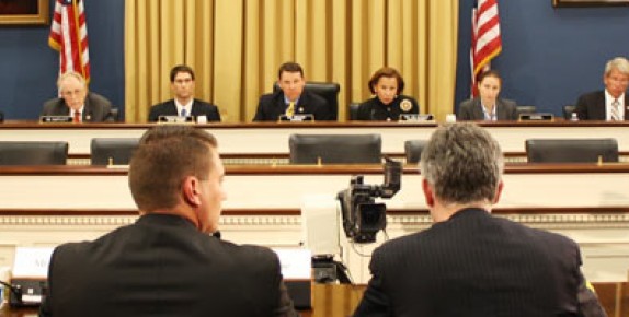 Wide angle view of a congressional hearing.