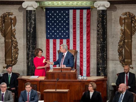 Outgoing Majority Leader passes the Speaker's gavel onto incoming Speaker Nancy Pelosi.
