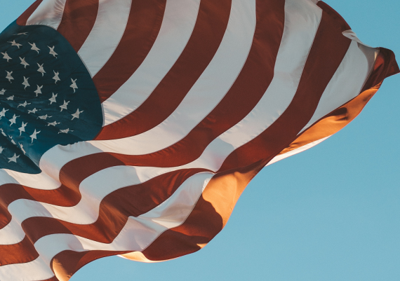 Image of American flag against a blue sky