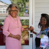 Congresswoman Beatty stands with a new homeowner.