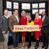 Congresswoman Beatty stands with "Rosa Parks Way" sign.