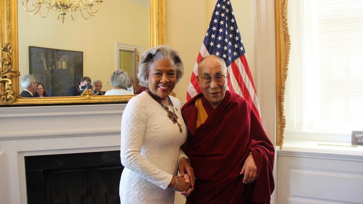 Congresswoman Beatty stands with His Holiness the Dalai Lama.
