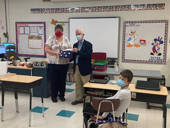Bill Johnson presented a new American flag to 5th graders at Meigs Intermediate School on October 20.