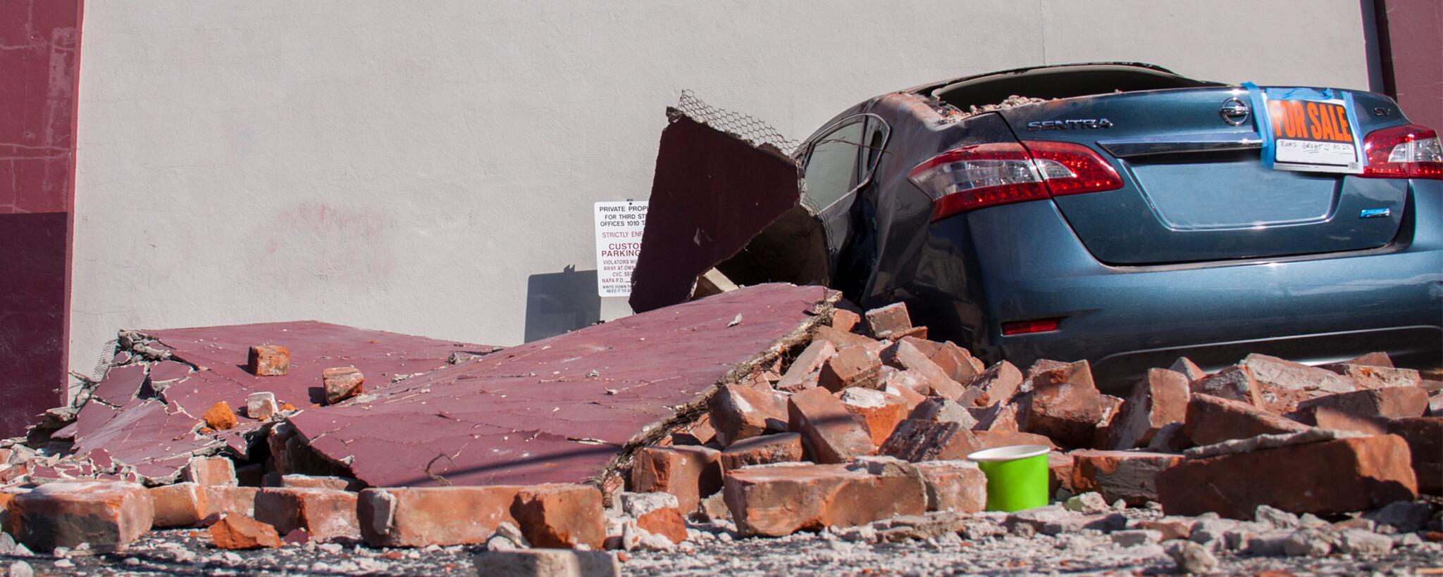a car damaged by an earthquake