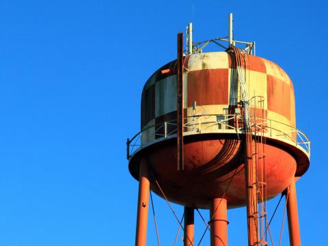 Decorative image. Watertower against a blue sky.