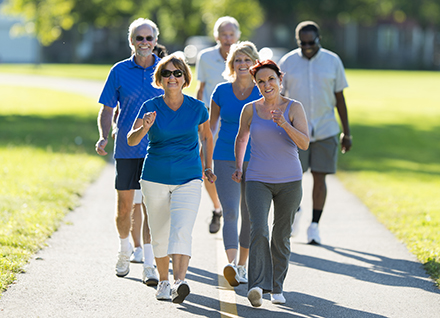 Group of adults power walking