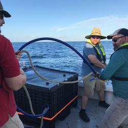 USGS technicians launch "sparker" used in seafloor mapping