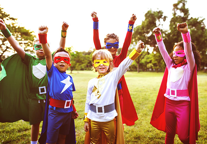 Kids dressed as superheroes