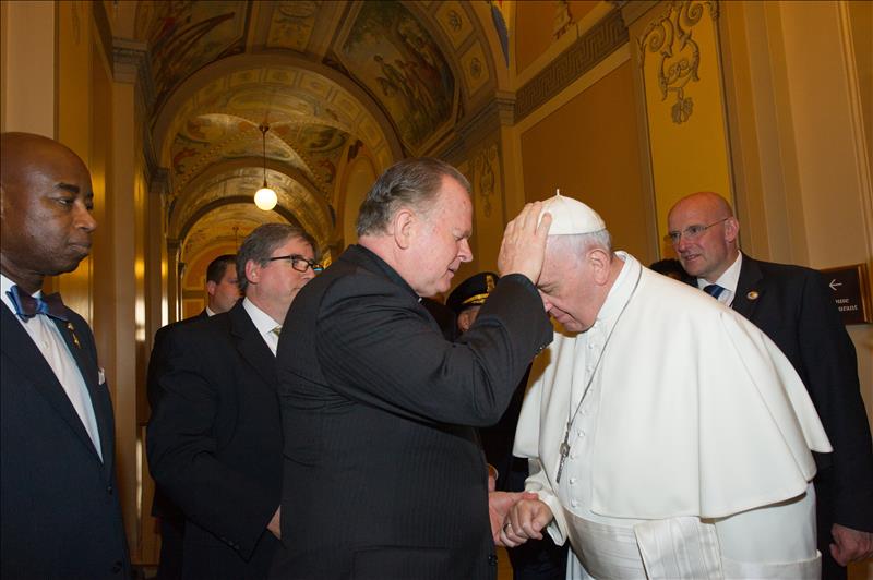 House Chaplain Rev. Patrick Conroy blesses Pope Francis upon his arrival to the Capitol