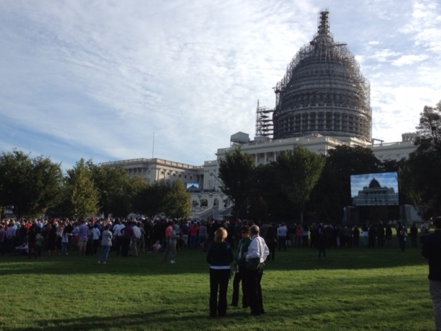 Screens were set up outside the Capitol so crowds could see the Pope's speech