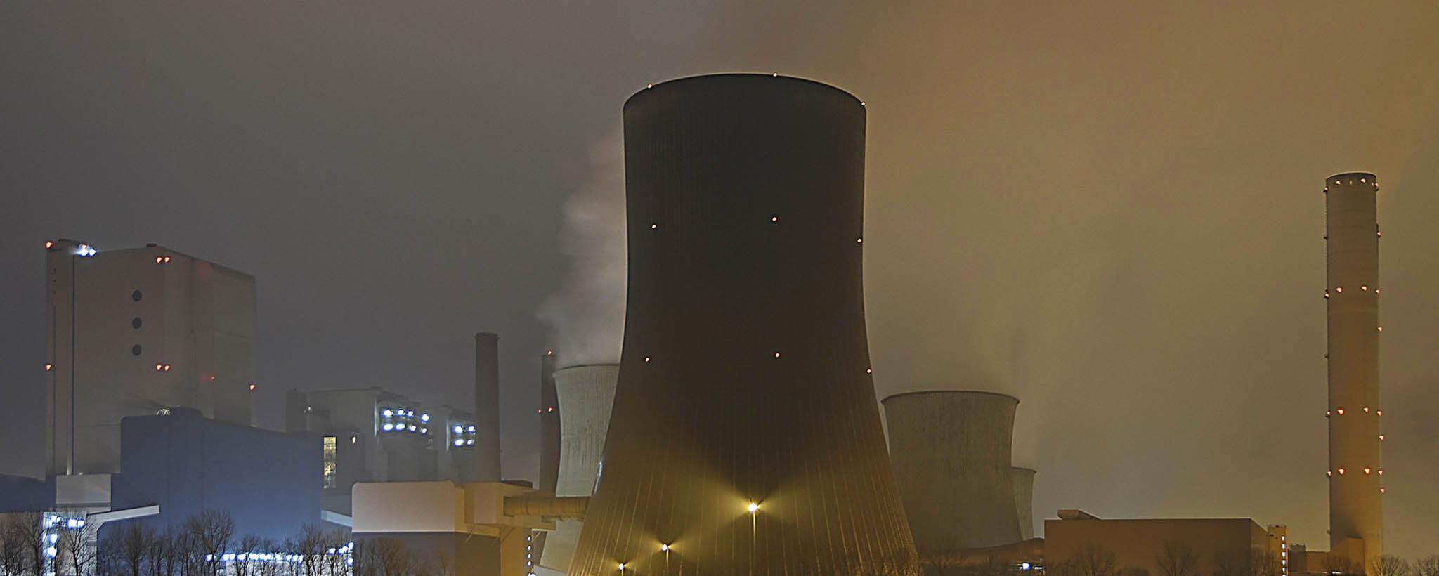 Power Plant Cooling Tower shown at dusk