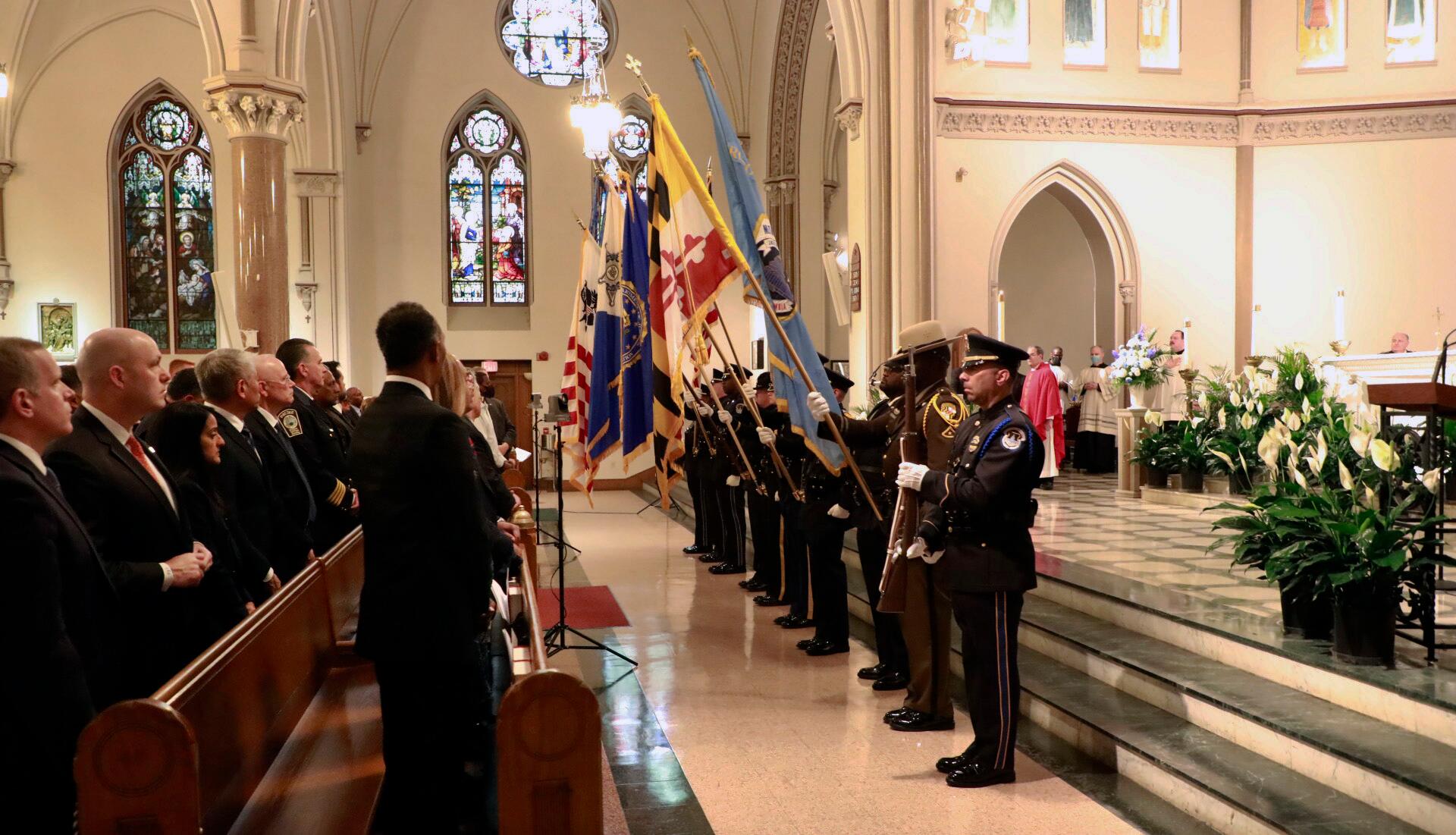 Blue Mass image showing the attendees and color guard in St. Patrick Church on May 3.