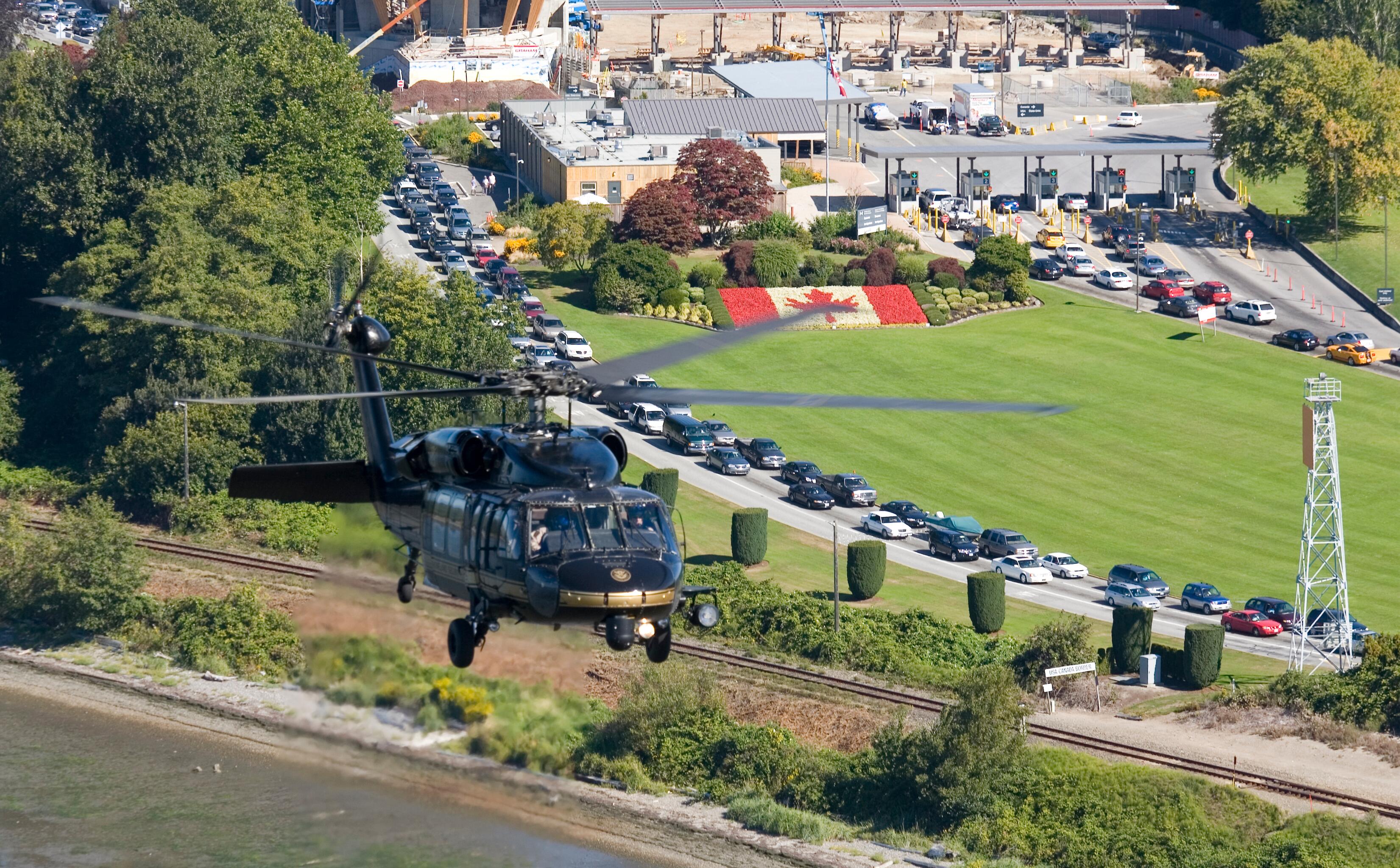An Air and Marine Operations UH-60 crew from the Bellingham Air and Marine Branch flies near the U.S./Canada border.
