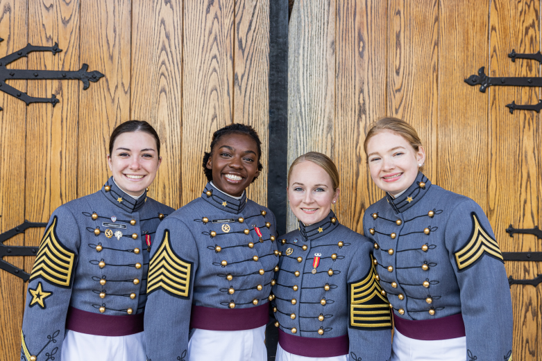 Four women in uniform celebrate their Rhodes Scholarships