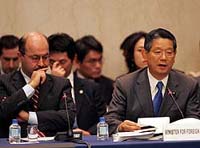 Japanese Foreign Minister Machimura delivers opening remarks at the Iraq donors conference in Tokyo, Wednesday, Oct.13, 2004.  (AP/WWP) 
