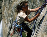 Photo of climber at rock peak