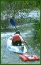 Kayaker pulling gaging equipment