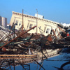 photograph of collapsed and burned buildings taken on October 17, 1989 at Beach and Divisadero in the Marina District, San Francisco