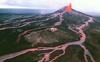 Lava fountain and lava flows on Pu`u `O`o, Kilauea Volcano, Hawai`i