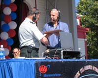 Mark accepts the National Guard Association of the United States Patrick Henry Award from Adjutant General Larry Shellito of the Minnesota Army National Guard at the 26th Annual Armed Services Day at Valley Fair.