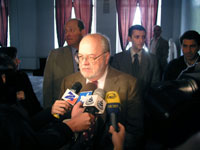 Ambassador Miles gives an interview to local press at the opening of the U.S. Education Fair, October 9, 2004