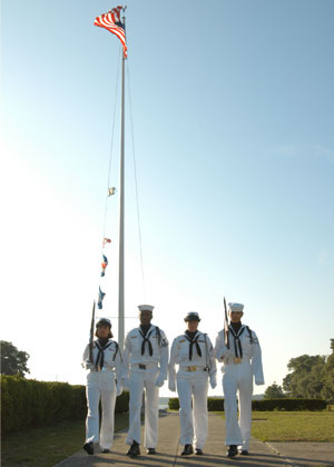 The Naval Hospital Beaufort's Color Guard marches into position after a morning colors ceremony at the NHB. The color guard raises the flag Monday through Friday at 8:00 a.m. Their services are also utilized at funerals and retirement ceremonies.
Photo by: Lance Cpl. Brian Kester 