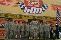 The 82nd Airborne Division's chorus sings the national athem March 14 during the pre-race show of the Nextel Cup Golden Corral 500.  (Photo by Spc. Jennifer J. Eidson, USASOC PAO)
