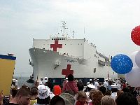  Friends and family members of Sailors aboard the hospital ship USNS Comfort (T-AH 20) greet the ship in Baltimore as she returns from a 5-month deployment in support of Operation Iraqi Freedom. The ship departed on Jan. 6. Comfort is longer than three football fields, has 1,000 beds (more than most city hospitals), and has a 50-bed emergency room (larger than any hospital in U.S.) U.S. Navy photo by Aviation Maintenance Administrationman 1st Class John E. Reynolds. (RELEASED) 