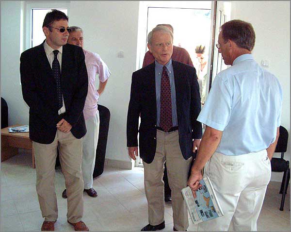 From left to right: USAID Senior Management Specialist Vladan Raznatovic, Dr. Haltzel and IRD Chief of Party Robert Harris at the reconstructed Community Center in Rafailovici 