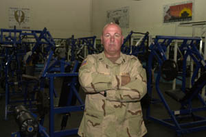 Army National Guard Sgt. 1st Class John Banks recently visited the gymnasium that he created for American troops at Camp Doha in Kuwait a dozen years ago, after Operation Desert Storm. Banks was on his way to Iraq for a tour of duty during Operation Iraq Freedom.