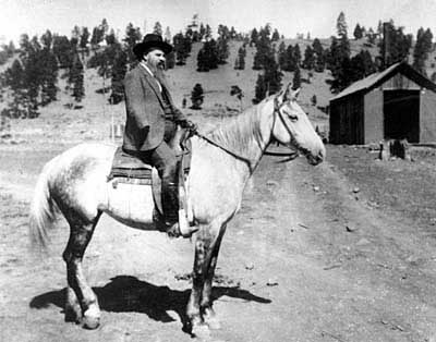 J.W. Powell on horseback