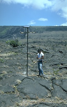 Electronic technicians installing new seismic station