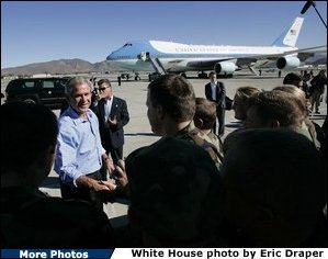 President George W. Bush greets base personell before departing aboard Air Force One at Reno/Tahoe International Airport-Nevada Air National Guard Base, Thursday, Oct. 14, 2004. White House photo by Eric Draper.