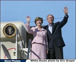 President George W. Bush and Mrs. Bush arrive aboard Air Force One at Reno/Tahoe International Airport, Thursday, Oct. 14, 2004. White House photo by Eric Draper.