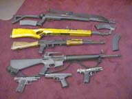 4 assault rifles and 3 handguns were recovered from an alien harboring site in Phoenix.