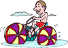 Image of boy on big water tricycle