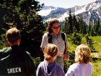 Photo of ranger talking with kids at Mount Rainier NP