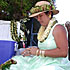 Link to "Park Partners" - picture of a woman demonstrating Hawaiian crafts at the annual Kilauea Cultural Festival 