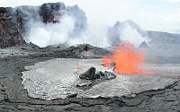 View of lava spattering in crater of Pu`u `O`o, Kilauea Volcano, Hawai`i 