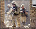 Soldiers from 1st Battalion, 77th Armor Regiment, 1st Infantry Division, fight house-to-house during Operation Baton Rouge, in Samarra, Iraq.    This photo appeared on www.army.mil.