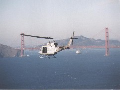 Uh1n flying near golden gate bridge