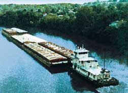 photo of barges on river