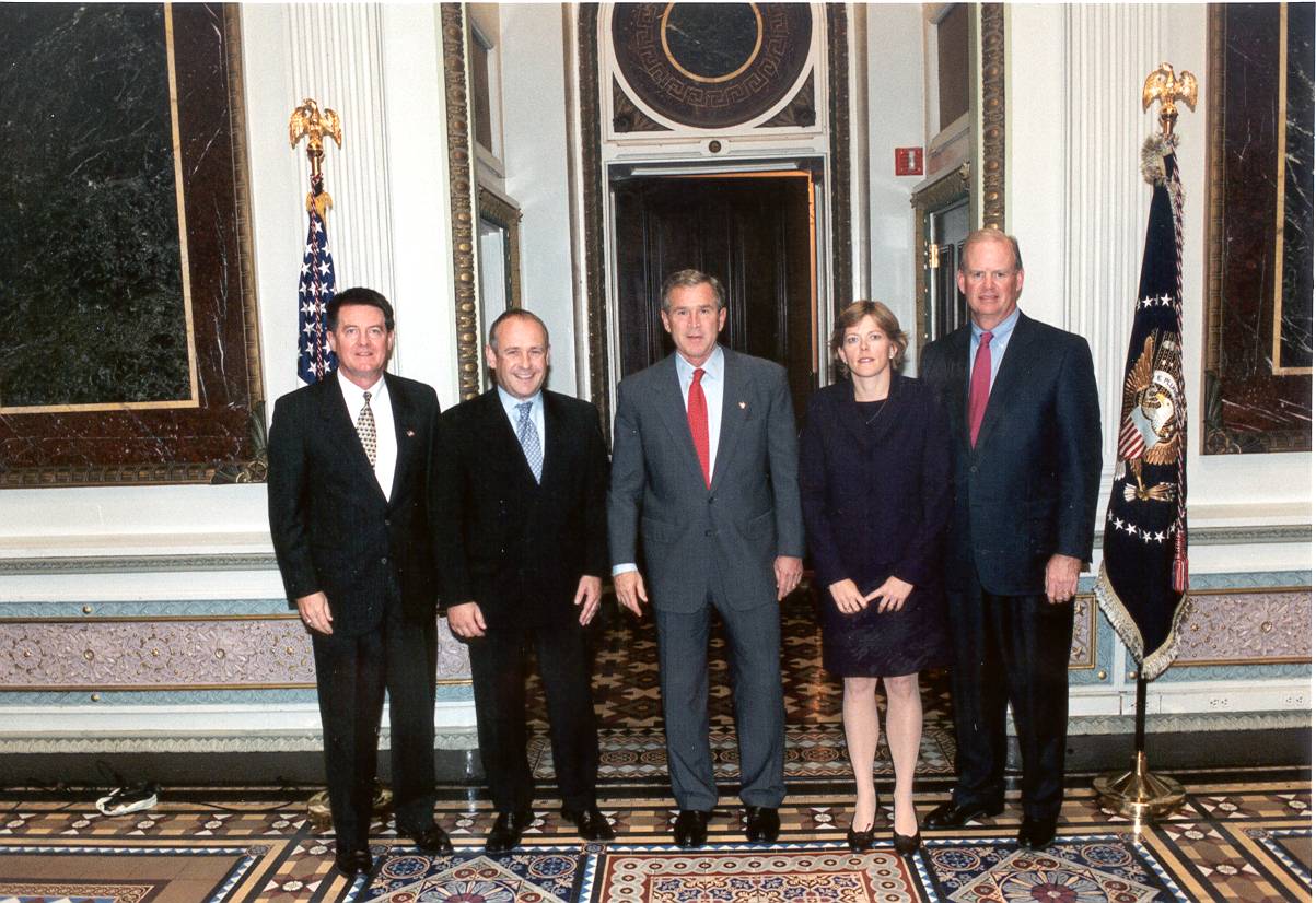 Photo of President Bush and Officials who are members of both the PCIE and ECIE