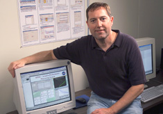 Picture of Tom Chidester and the APMS System