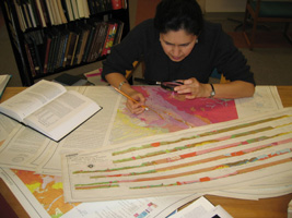 Geologist Martha Garcia at work in the library.