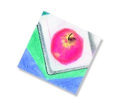 apple on top of book